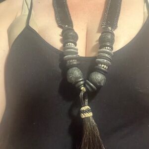 beaded necklace suede leather stitching and tassel braided on with hemp rope